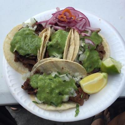 Asada tacos with the green salsa, insanely delicious!