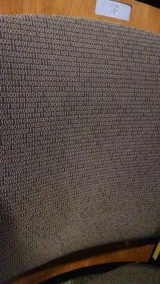 Seats in the auditorium on 4th floor are covered in binary. Awesome.