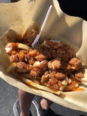 Saucy Cajun Catfish Fries this was served in a small container with about a handful of fries.