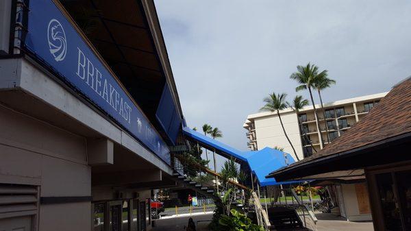 Stairway awning and you can kind of see the roll down Sun shades.