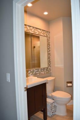 Guest bathroom turned out amazing.  Paul's work on the mirror and frame make the room.