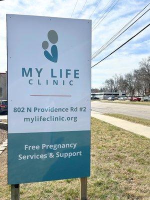 Our road sign on Providence. My Life Clinic is located  off Providence and Wilkes and behind Hickman High School.