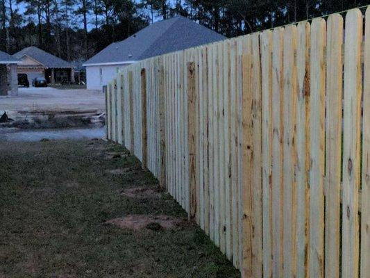 Shadow box wood privacy fence in Mack Bayou area Destin, Fl.