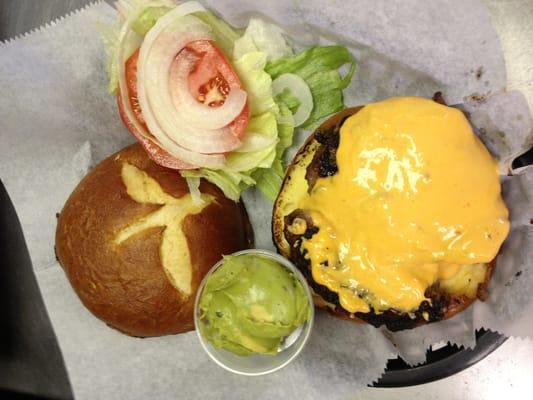 Jalapeño Burger with wholly guacamole on pretzel bun!