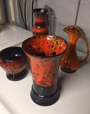 The vase in front I found here. Early 1970s California Originals Pottery. Bright glazes dripping down the sides. Like lava.