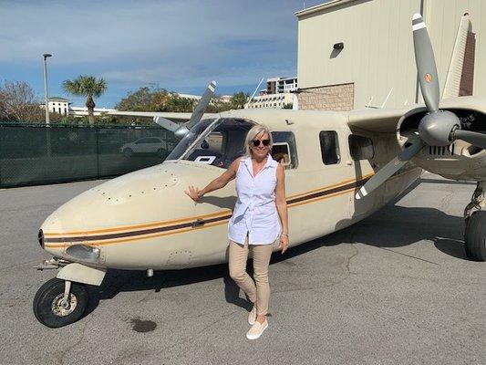 Jane flying off from downtown St. Pete to her office in Key West