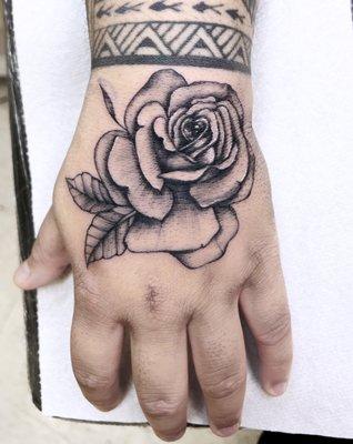 Rose hand tattoo