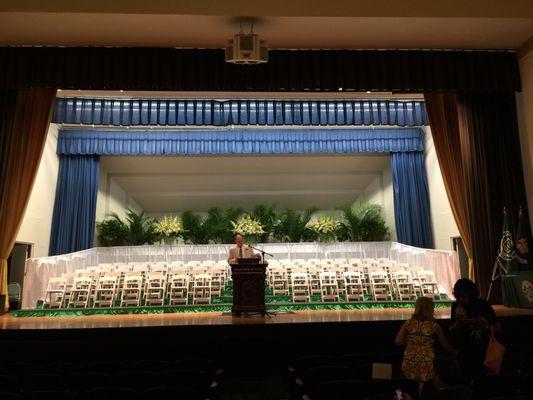 Stage of McAllister Auditorium set up for graduation