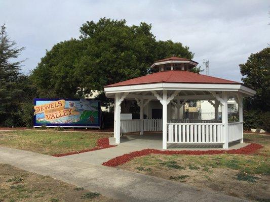 Gazebo out front with jewels of the valley mural