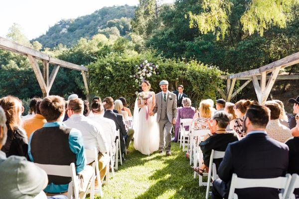 Ceremony in the greenhouse structure.