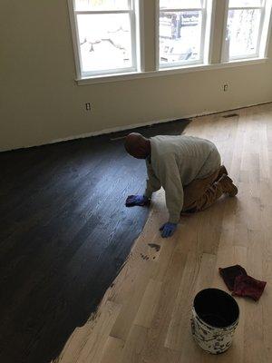 Staining after complete sanding hardwood floor.