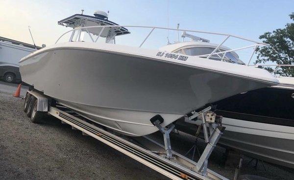 38' Fountain Center Console after Wrap and Registration Numbers