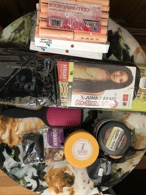 Synthetic hair, rollers, brush, jam, edge control and moisturizer