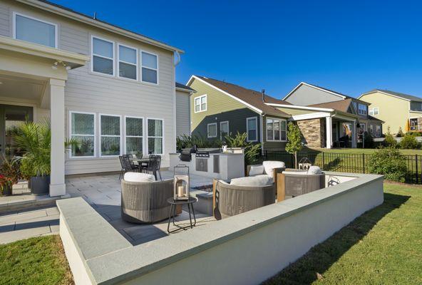 Beautiful patio with sitting wall.