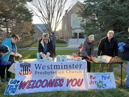 Preparing to cheer on Lincoln Marathon runners! Look for our table for water and pick-me-ups for runners and spectators!