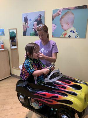 Getting her first haircut