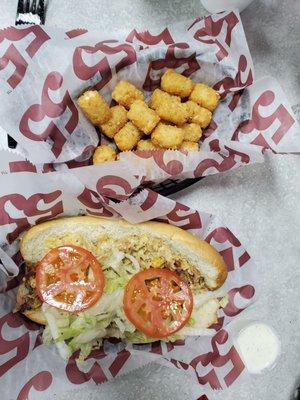 Chicken sandwich with tater tots