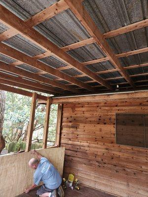 Applying weather resistant siding to interior of Bannister