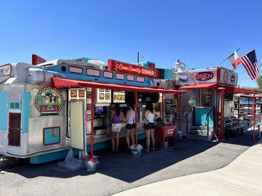 Outside ordering at Cross Country Diner. Indoor and outdoor seating.