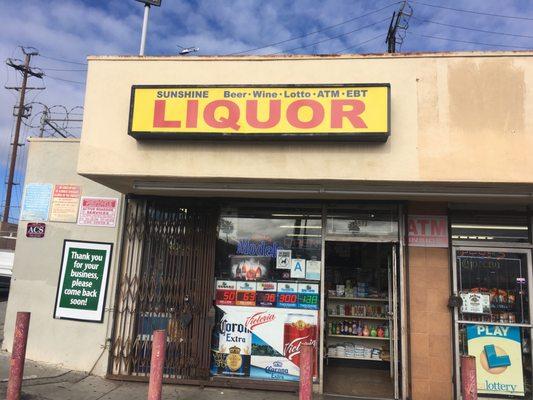 Front of liquor store from parking lot.