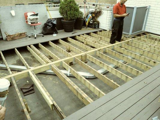 Robert fixing yet another condo building.  Notice the new custom drain system.