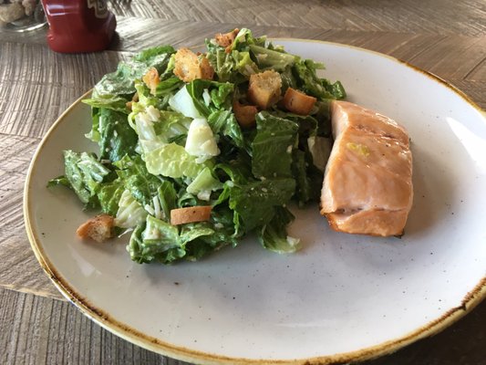 Caesar salad with grilled salmon