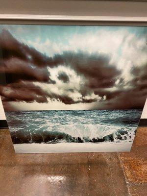 Like these brooding sea shots on glass...consider for bathroom but I like my BLANK, empty wall space!