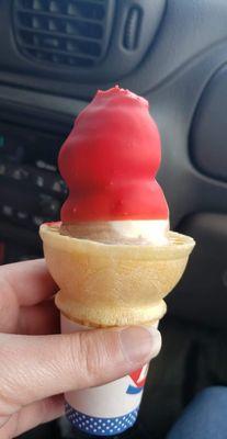 A very tiny ice cream cone.