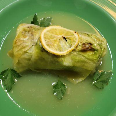 Cabbage stuffed with lean ground beef, herbs, apricots, toasted pine-nuts with meyer lemon and chicken stock.