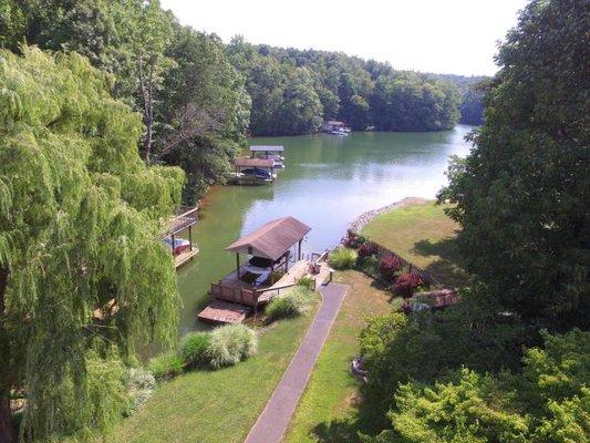 Covered dock, large lot, 5BR/3BA, garage, $519,000