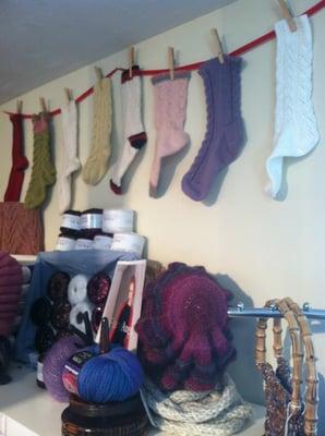 Sock garland by Melissa Mooncai, Master Knitter.  Sign up for classes with Melissa Mooncai on Mondays and Thursday.