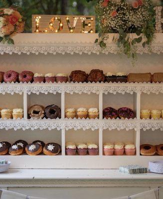 Cupcake display at our wedding (donuts from another bakery).