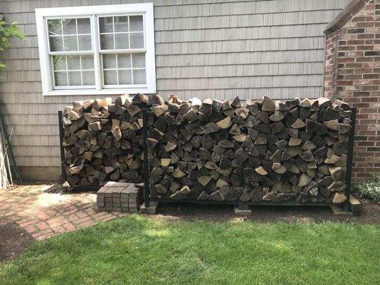 Wood stacked outside a customers home