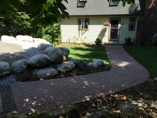 Complete Landscape to mitigate erosion
Boulder Wall, Paver Walkway, SOD, and Perennials.
Bridgton, Maine