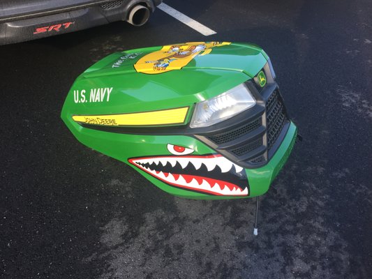 Logo from my Grandpa's training Squadron, plus some flying tiger graphics, on the hood of my John Deere