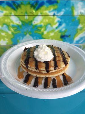 Our fluffy Pancakes with chocolate and caramel drizzle. The sweetest day to start your day.