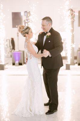 Norita and Michael loving their production! First Dance with a little extra oomph! Our DJ Service is complimented by cold sparks!