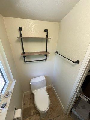 Bathroom painted and racks mounted.