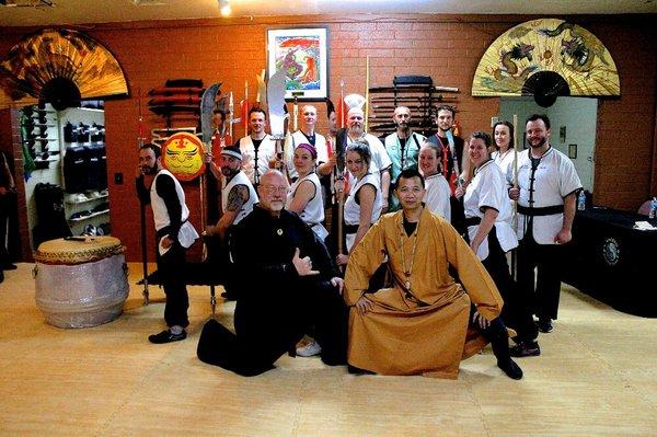 Sacred Mountain's first class of black belt graduates with Sifu Banks and Master Instructors.