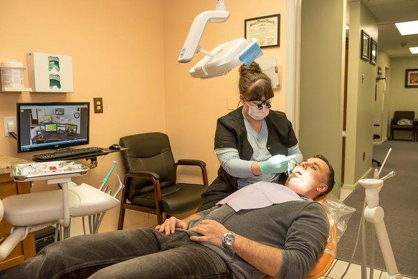 Our Dental Hygienist working on a patient