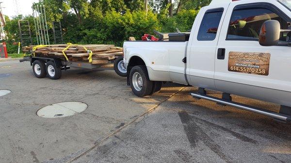 Bringing in freshly milled live edge slabs