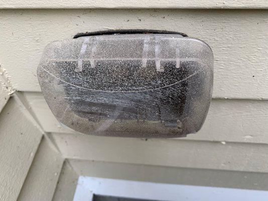 While most exterior fixtures were protected with film, they didn't do so for an electrical outlet cover. Paint spatter all over!