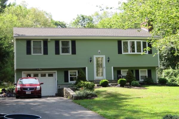 This beautiful home uses a two-tone color scheme to create great contrast, highlight the windows and doors, and stand out from the crowd.