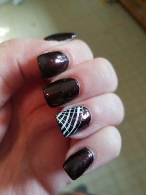 Halloween spiderwebs the owner hand painted at V Nails.