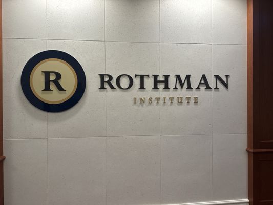 Rothman logo as you exit the elevators