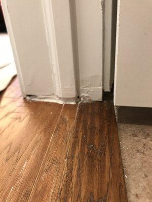 They damaged some of the pieces of trim, cut off the damaged part and reinstalled it.  Then they filled the gap with caulk.