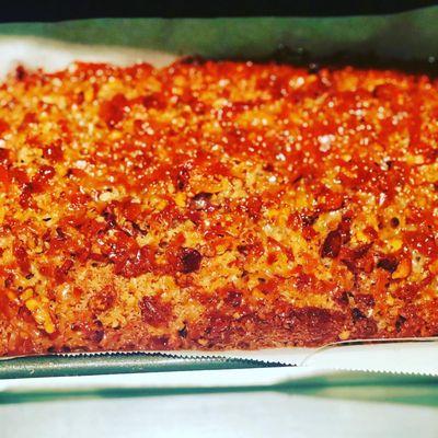 Banana Coconut Loaf with warm salted carmel - $4 per slice.  Contains nuts and dairy