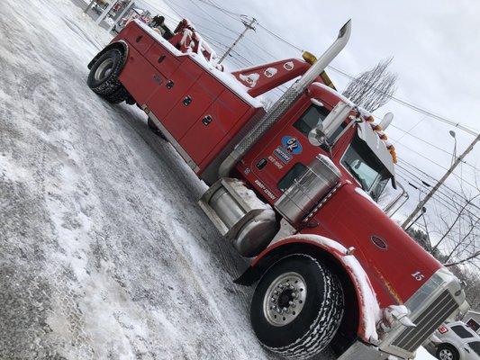 Our heavy wrecker out in the snow