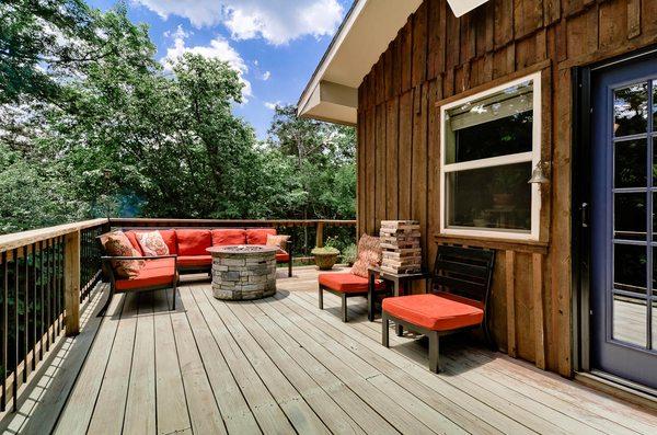 There is a hot tub, and wonderful decks to watch the kids in the lake.