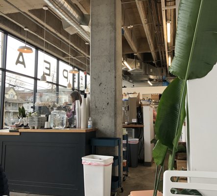 A handful of tables and several window pub chairs in this cozy coffee spot.